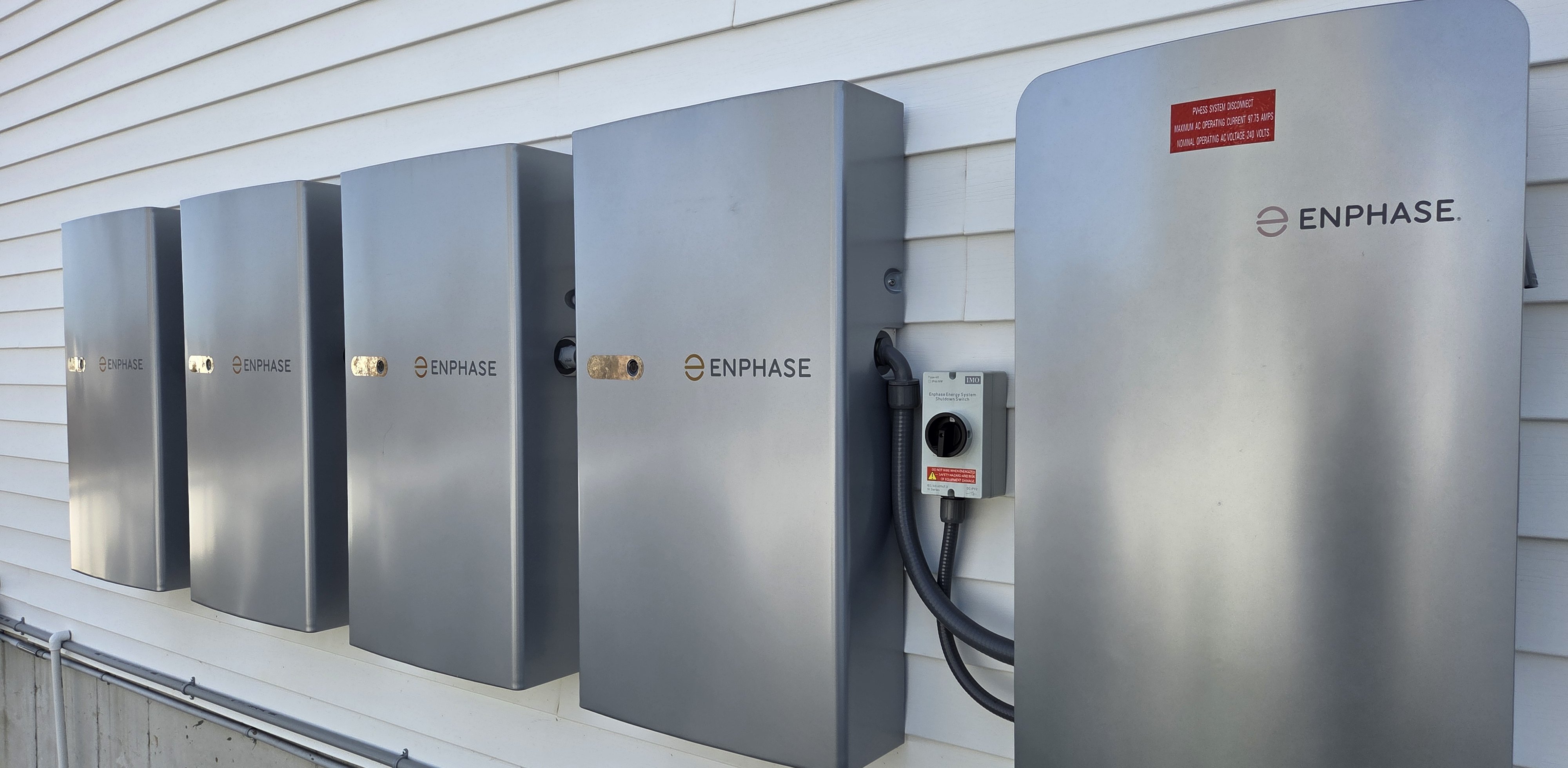 Enphase IQ Battery 5P units mounted on a wall